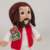 The Shoebox Jesus Doll from Jesusdoll.com. Side view with new tag (2026) visible.