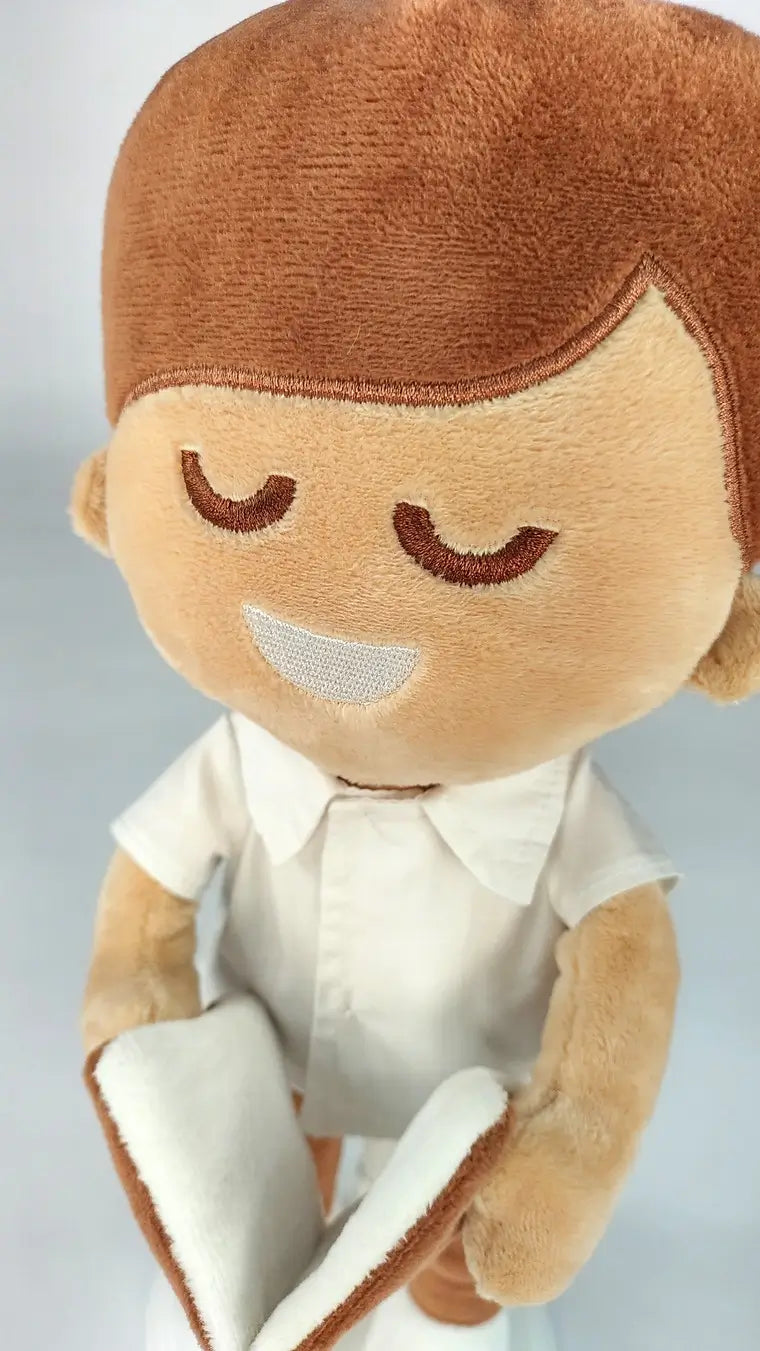 BibleGirl plush girl doll that speaks Bible verses.  Holds her Bible with magnets in her hands and in the Bible.