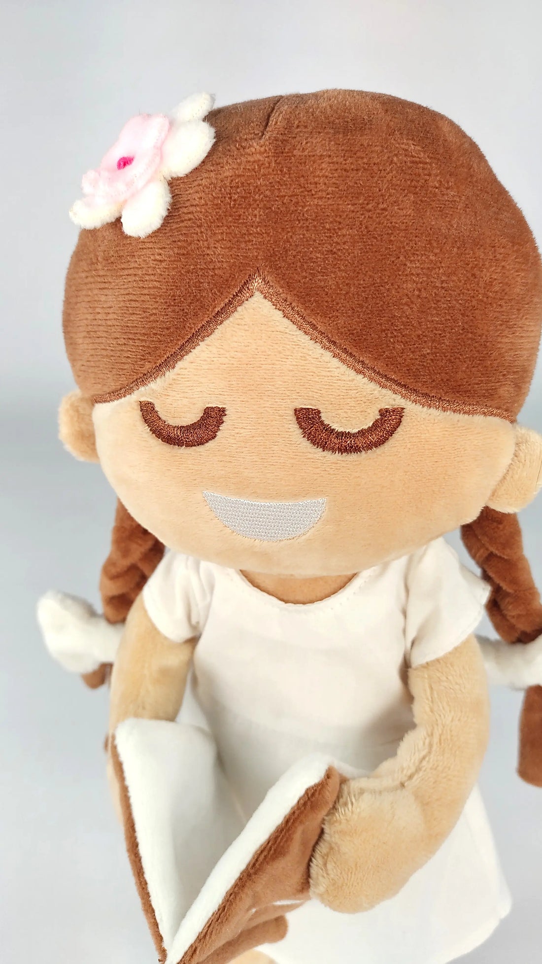 BibleGirl plush girl doll that speaks Bible verses.  Holds her Bible with magnets in her hands and in the Bible.