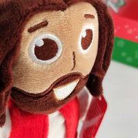 This plush Jesus has embroidered features for safety. 