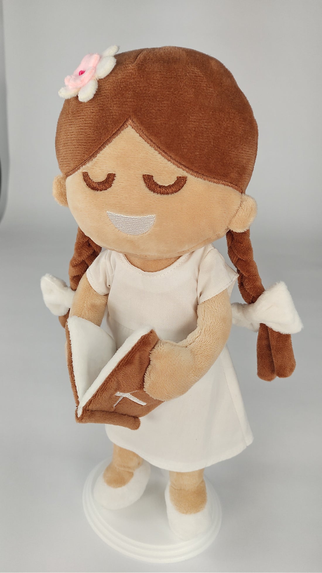 BibleGirl plush girl doll with modest dress holds her Bible.