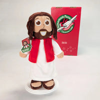 The Shoebox Jesus Doll stands in front of an Operation Christmas Child shoebox.  A perfect WOW gift for shoebox donations.  Bulk pricing available.
