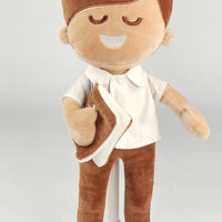 BibleBoy plush boy doll with buttoned up shirt and slacks holds his Bible .