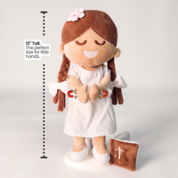 BibleGirl is the adorable plush girl doll that speaks 36 Bible verses.  Holds her Bible with magnets in her hands and in the Bible.  Wholesome dress.  Beautiful braids with bows and a flower in her hair.  Perfect Baptismgift idea for Christian girls.  From Jesusdoll.com.