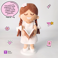 BibleGirl is the adorable plush girl doll that speaks 36 Bible verses.  Holds her Bible with magnets in her hands and in the Bible.  Wholesome dress.  Beautiful braids with bows and a flower in her hair.  Perfect Christmas  gift idea for Christian girls.  From Jesusdoll.com.